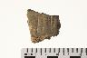     002-011.1a.JPG - Prehistoric body sherd, decorated, Sand body sherd, possible cord mark, from site 12CL1
        
