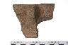     041-086.1a.JPG - Prehistoric rim sherd, undecorated, with handle, from site 9CY62
        
