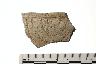     001-081.1a.JPG - Prehistoric rim sherd, decorated, from site 1RU-JM7
        
