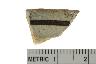     005-004.1a.JPG - Historic rim sherd, decorated, One artifact marked "206", from site 9LC24
        
