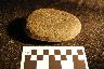     [BasaltAndesite] 6. Unshaped flat grinding slab handstone after 2 hrs 20 mins small seed processing, close-up.JPG 
        
