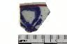     001-075.1a.JPG - Historic rim sherd, decorated, from site 46LE06
        
